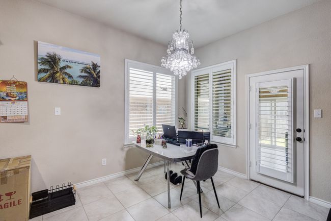 Office with plenty of natural light, a chandelier, and baseboards | Image 11