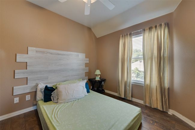 Upstairs bedroom 5 with baseboards and ceiling fan | Image 28