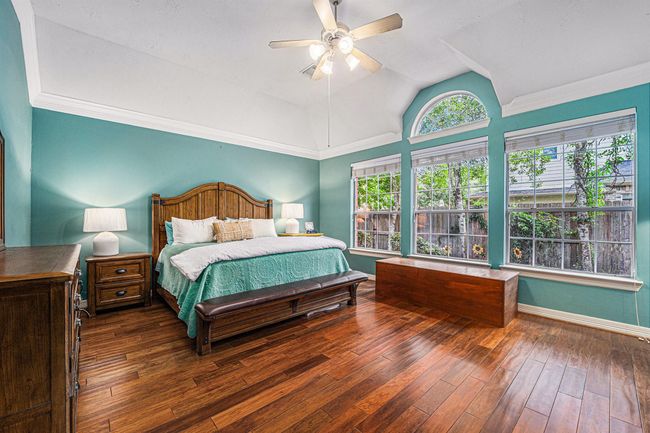 Gorgeous primary bedroom overlooking the backyard. | Image 22