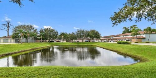 910 Cypress Way E, Palm Springs, FL, 33406-7597 | Card Image