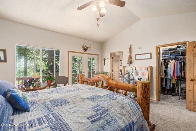 Master bedroom suite with French-doors to the rear deck | Image 19