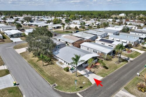 856 Periwinkle Cir, Barefoot Bay, FL, 32976-7673 | Card Image