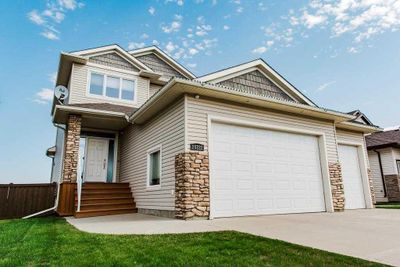 10222 154 Ave, House detached with 4 bedrooms, 3 bathrooms and 6 parking in Grande Prairie AB | Image 1