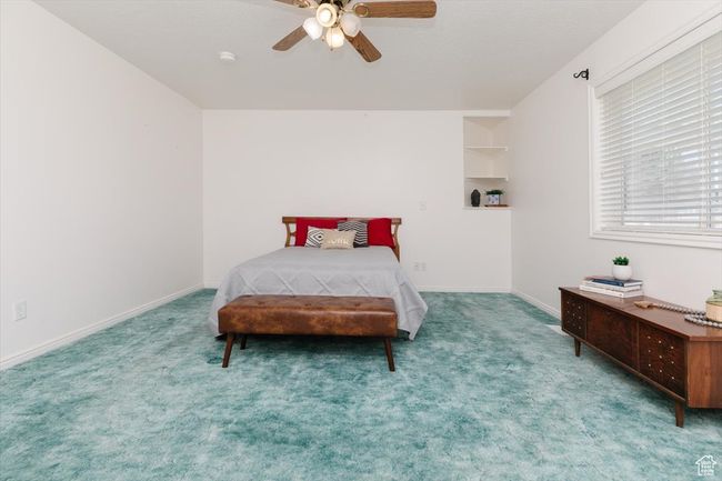 Bedroom featuring carpet and a ceiling fan | Image 28