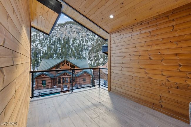 Balcony featuring a mountain view | Image 23