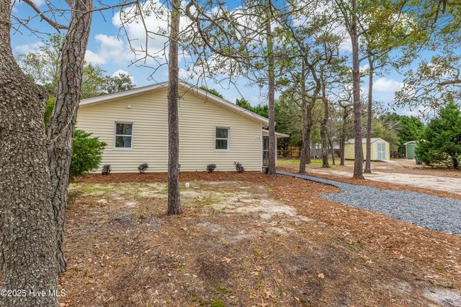 114 Nw 14 Th St, House other with 3 bedrooms, 2 bathrooms and null parking in Oak Island NC | Image 45