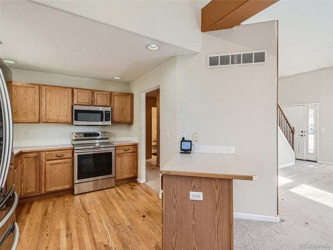 165 S Grand Avenue, House other with 3 bedrooms, 3 bathrooms and 2 parking in Fort Lupton CO | Image 11