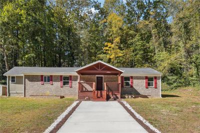 4670 Brookwood Drive, House other with 4 bedrooms, 2 bathrooms and null parking in Cumming GA | Image 1