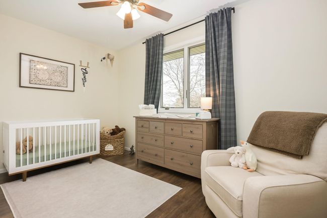 2nd bedroom has double closet and updated flooring | Image 28