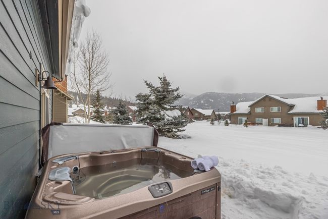 Hot tub on the patio to relax and rejuvenate after a day on the slopes | Image 10
