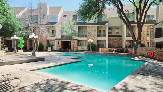 Swimming pool with a patio | Image 20