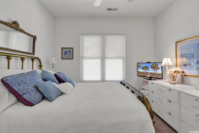 Bedroom #2 - Carpeted bedroom featuring ceiling fan | Image 7