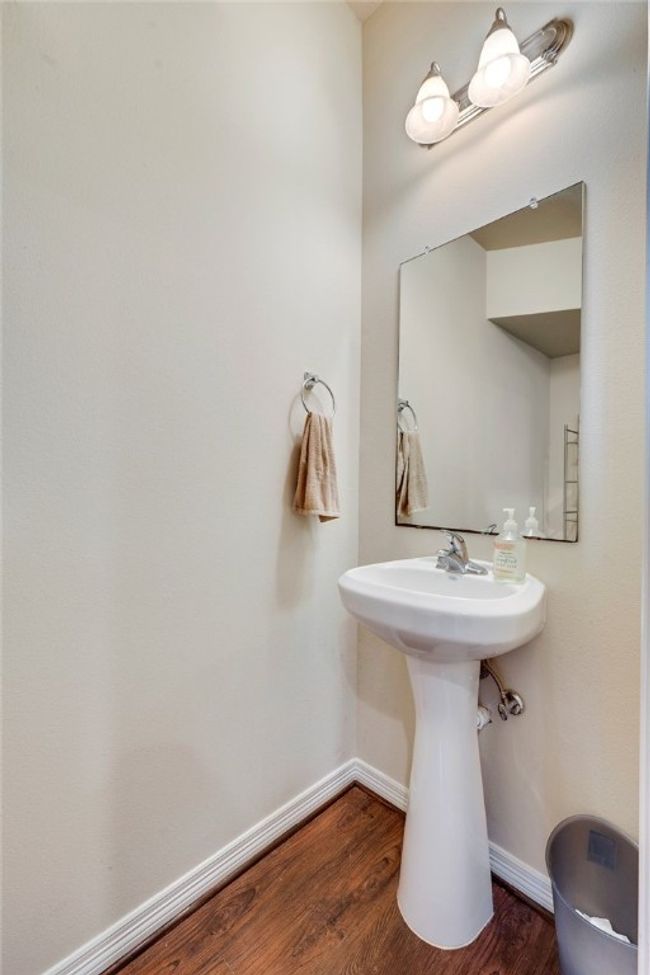 First floor half bathroom convenient for guest use | Image 6