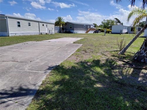 7448 Arbela St, PORT CHARLOTTE, FL, 33981-2639 | Card Image