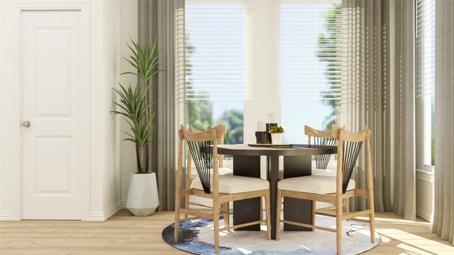 Dining space featuring light wood finished floors and baseboards | Image 5