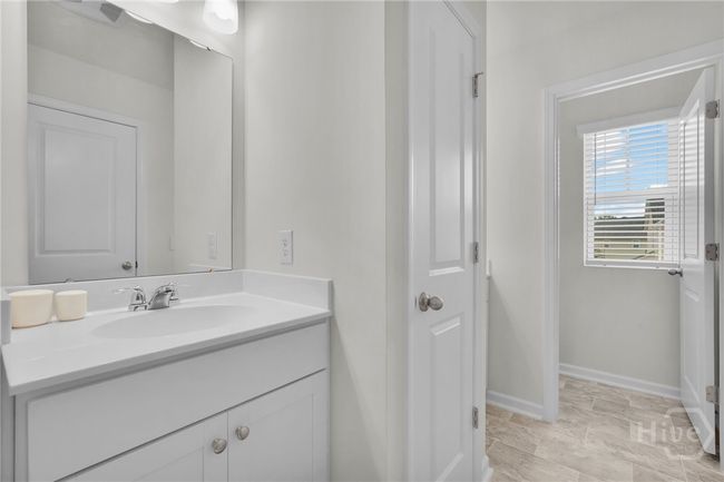 Master bathroom with double vanities, linen closet, walk in shower and separate water closet. | Image 43