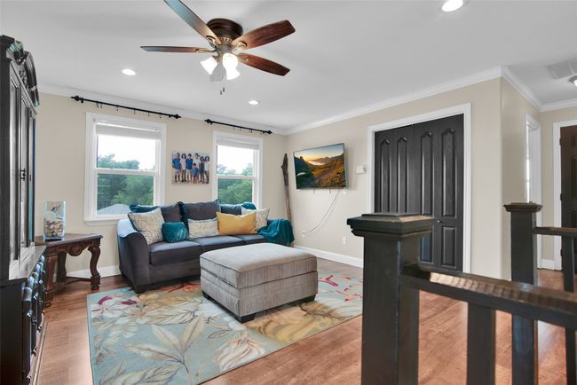 This flexible space is at the top of the stairs | Image 17