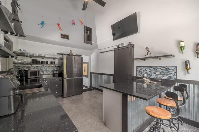 2196 Sw Ranch Trl, House other with 2 bedrooms, 2 bathrooms and 2 parking in Stuart FL | Image 13