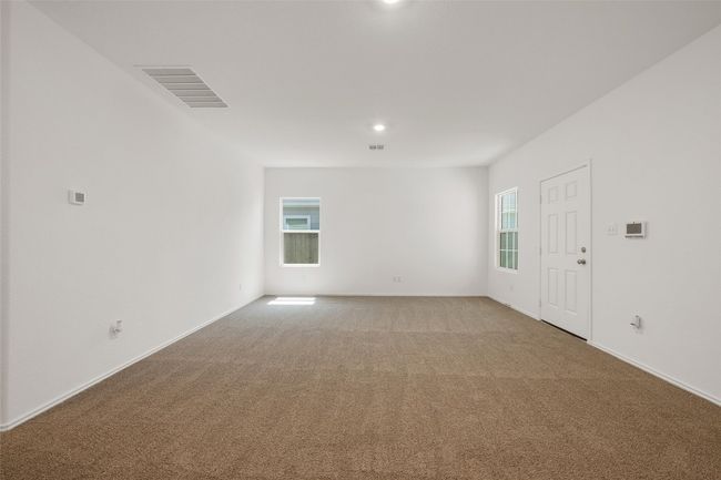 Empty room with light colored carpet and baseboards | Image 8