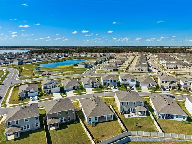 9804 Rowing Dale Bnd, House other with 4 bedrooms, 3 bathrooms and null parking in WESLEY CHAPEL FL | Image 57