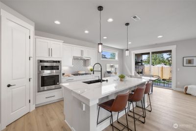 Photos are of model home and are for illustration purposes only to reflect typical finishes. May depict seller enhancements. Colors and options may vary | Image 2