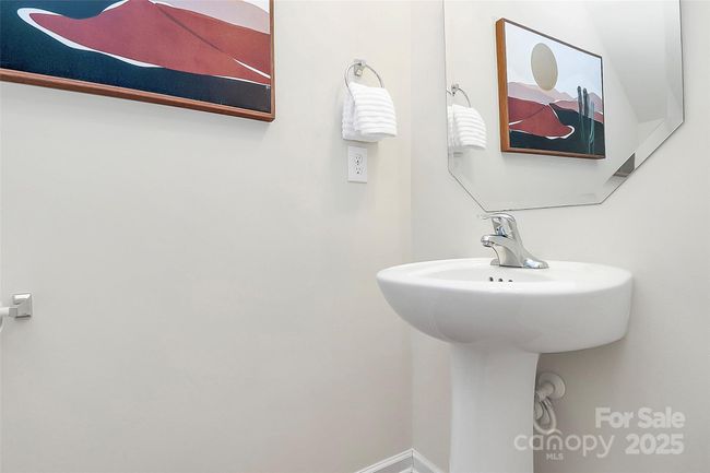 Downstairs powder room. | Image 15