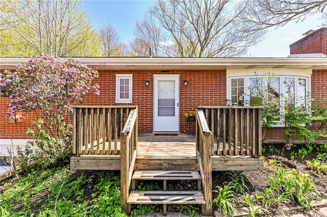 A nice front deck to relax on and enjoy the cool Spring breezes. | Image 6
