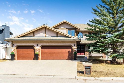 105 Candle Place Sw, Home with 4 bedrooms, 3 bathrooms and 6 parking in Calgary AB | Card Image
