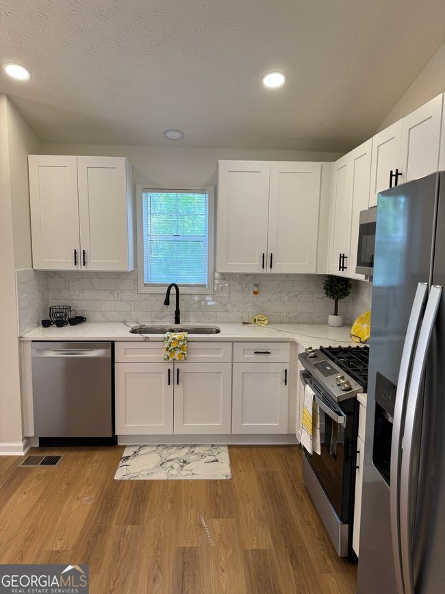 5920 Homestead Ct, House other with 4 bedrooms, 3 bathrooms and null parking in Rex GA | Image 5