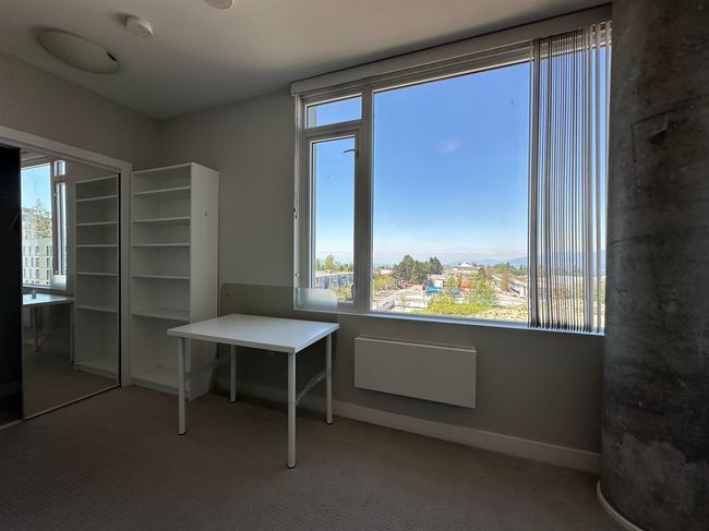 Unfurnished dining area with carpet floors and baseboards | Image 10