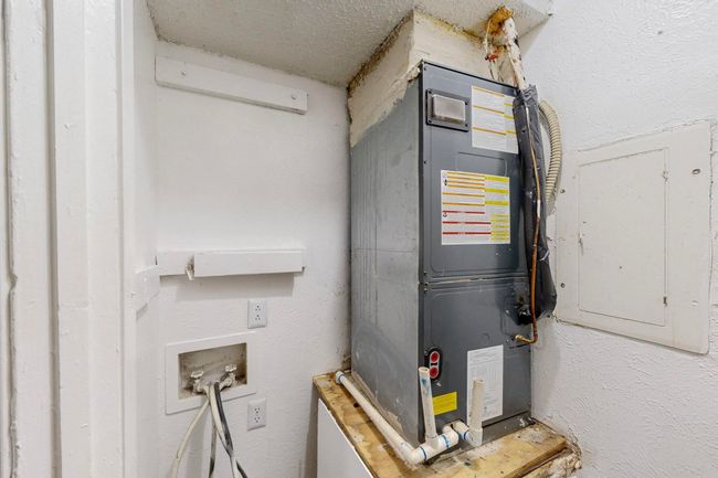 Utilities featuring heating unit | Image 35