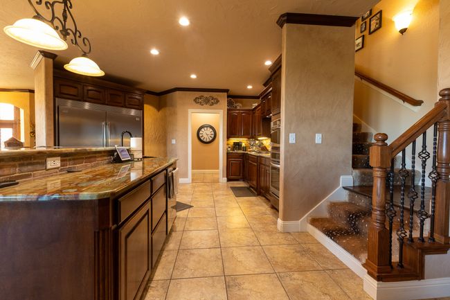 kitchen with back stair case | Image 19