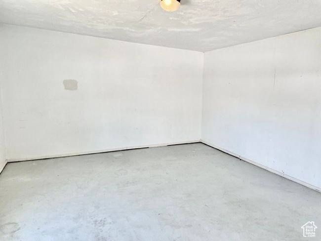Empty room featuring concrete floors | Image 17