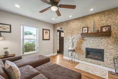 Living room/sitting room with fireplace | Image 3