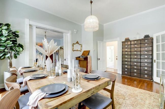 Dining space with a chandelier, wood finished floors, and ornamental molding | Image 8