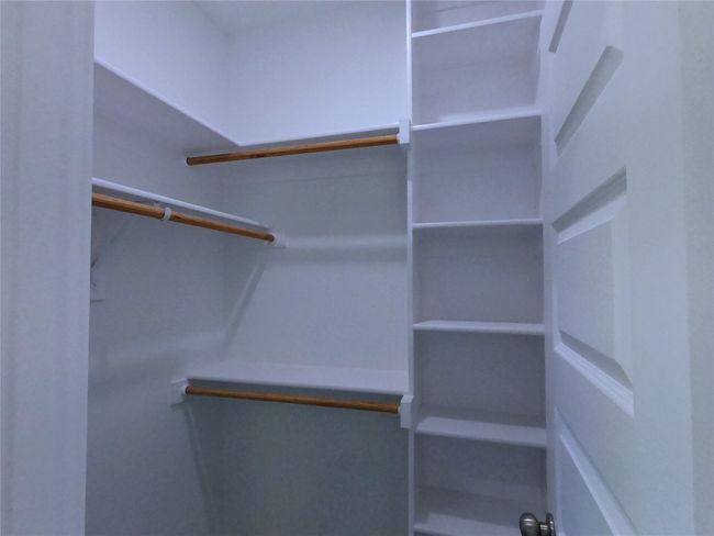 View of walk in closet | Image 11