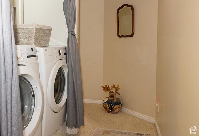 Laundry area featuring separate washer and dryer and carpet flooring | Image 21