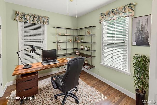 Office space with wood finished floors and baseboards | Image 27