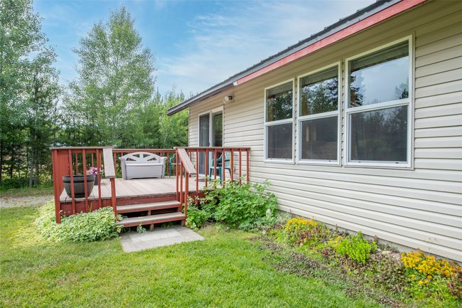 Wooden deck with a yard | Image 10