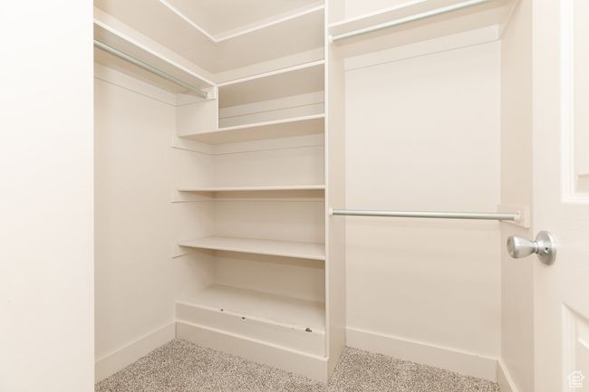 View of walk in closet | Image 15