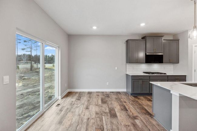 Loads of natural light for your kitchen and dinette. Model photo. Options and colors will vary. | Image 9