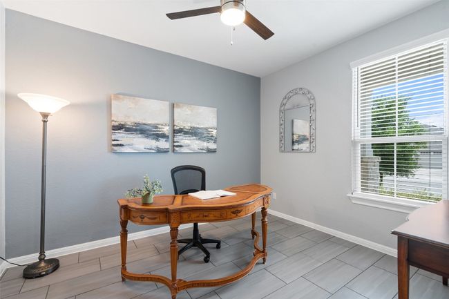 Spacious home office overlooking the front yard. | Image 5