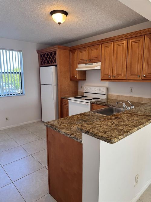 apt-206-5661 Riverside Dr, Coral Springs, FL, 33067-2934 | Card Image