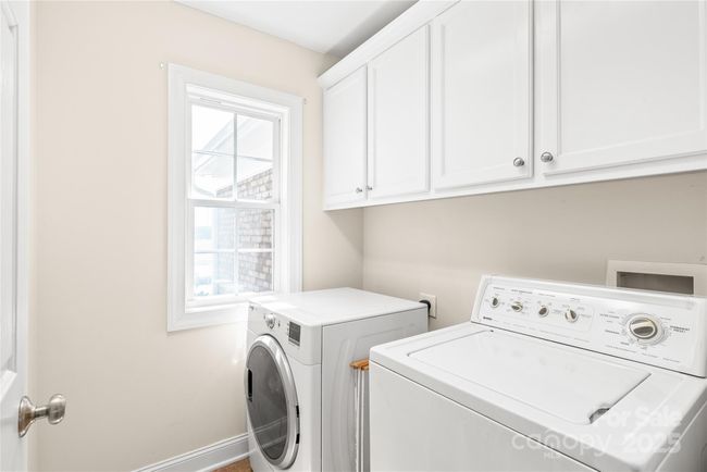 Laundry Room with Storage | Image 16