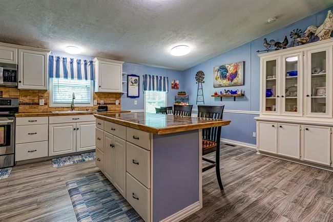 Build ins will provide you plenty of storage space. You'll love the open concept living area. | Image 6