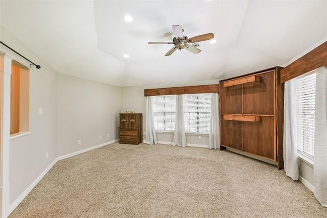 Space-saving custom Murphy bed enhances guest accommodations. | Image 28