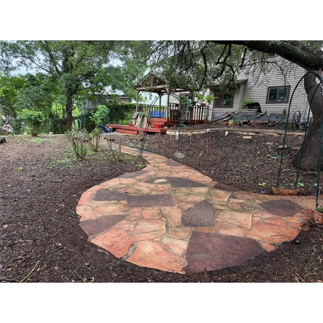 Backyard with rock patio | Image 9
