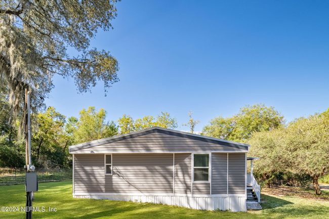 101 Tall Pine Trl, House other with 3 bedrooms, 2 bathrooms and null parking in SATSUMA FL | Image 4