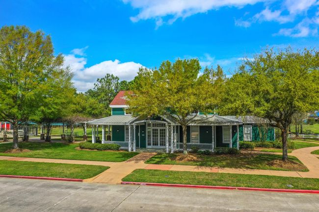 Windrose boasts beautifully designed clubhouse surrounded by lush courtyards, inviting benches, and scenic walking trails. A perfect setting for gatherings! | Image 43
