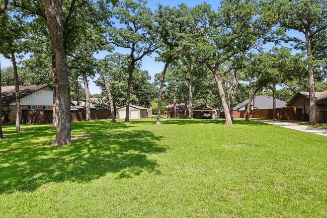 View of yard with a detached garage | Image 4